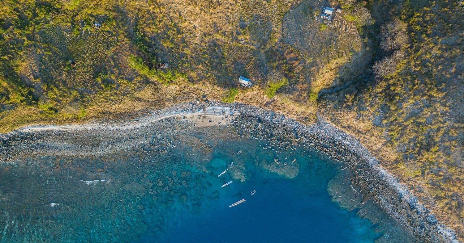 alor, yellow hill view on the background, blue turquoise sea water