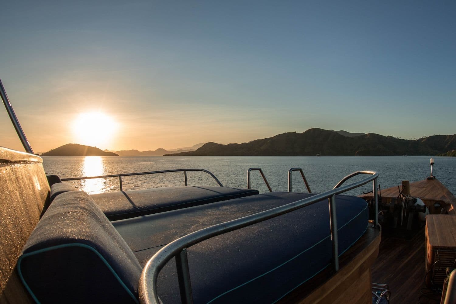 sunset view from the main deck, blue sky, wooden exterior